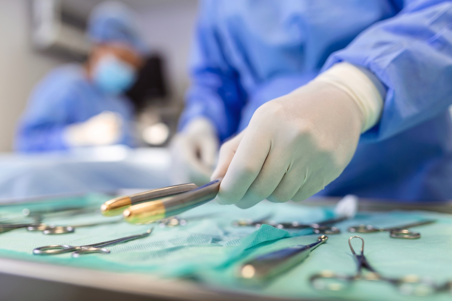 Surgical team selecting instruments in the operating theatre